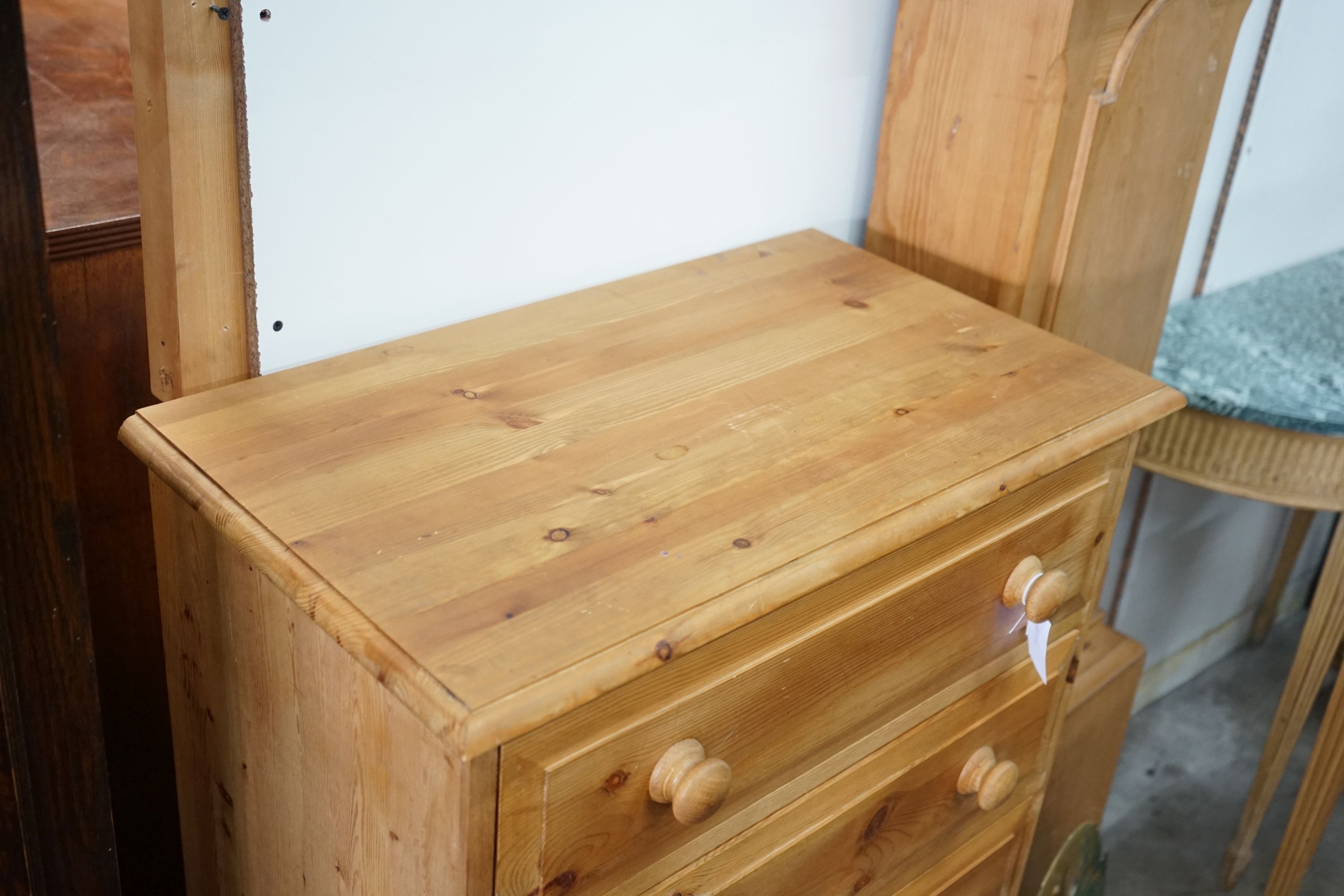 A small modern pine five door chest, width 69cm, depth 40cm, height 106cm